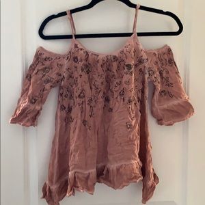 Gimmicks off the shoulder top